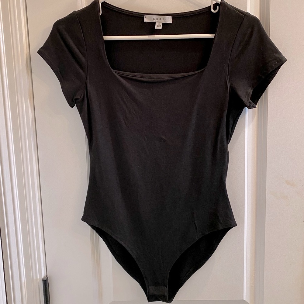 Small black short sleeve bodysuit